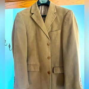 Genuine suede beautiful tan sports coat. Goes great with jeans or dress slacks.